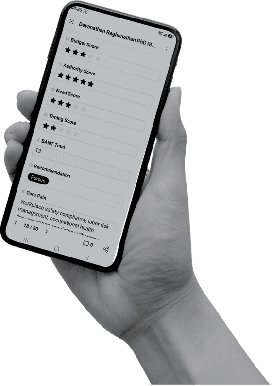 Hand holding a phone showing a marketing report